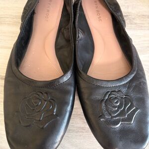 Taryn Rose Black Leather Flats with Embossed Rose